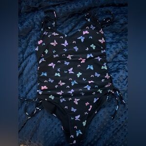 Adjustable butterfly one piece bathing suit.